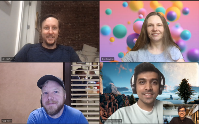 Four people on a video chat.